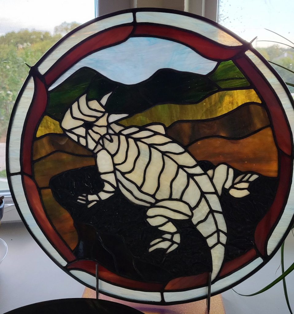 Stained glass horned lizard.
